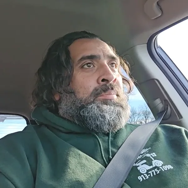 Jeff in a KC Mobility hoodie on a delivery drive.