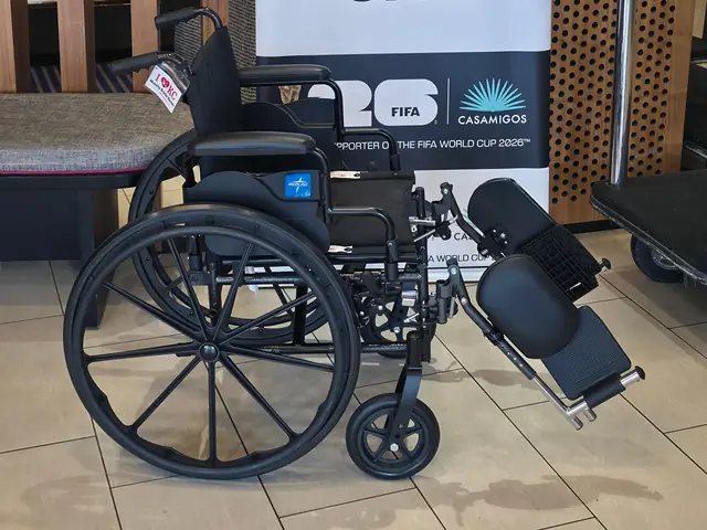 18-inch-seat manual wheelchair with elevating leg rests from KC Mobility Scooter Rentals in a Kansas City hotel lobby