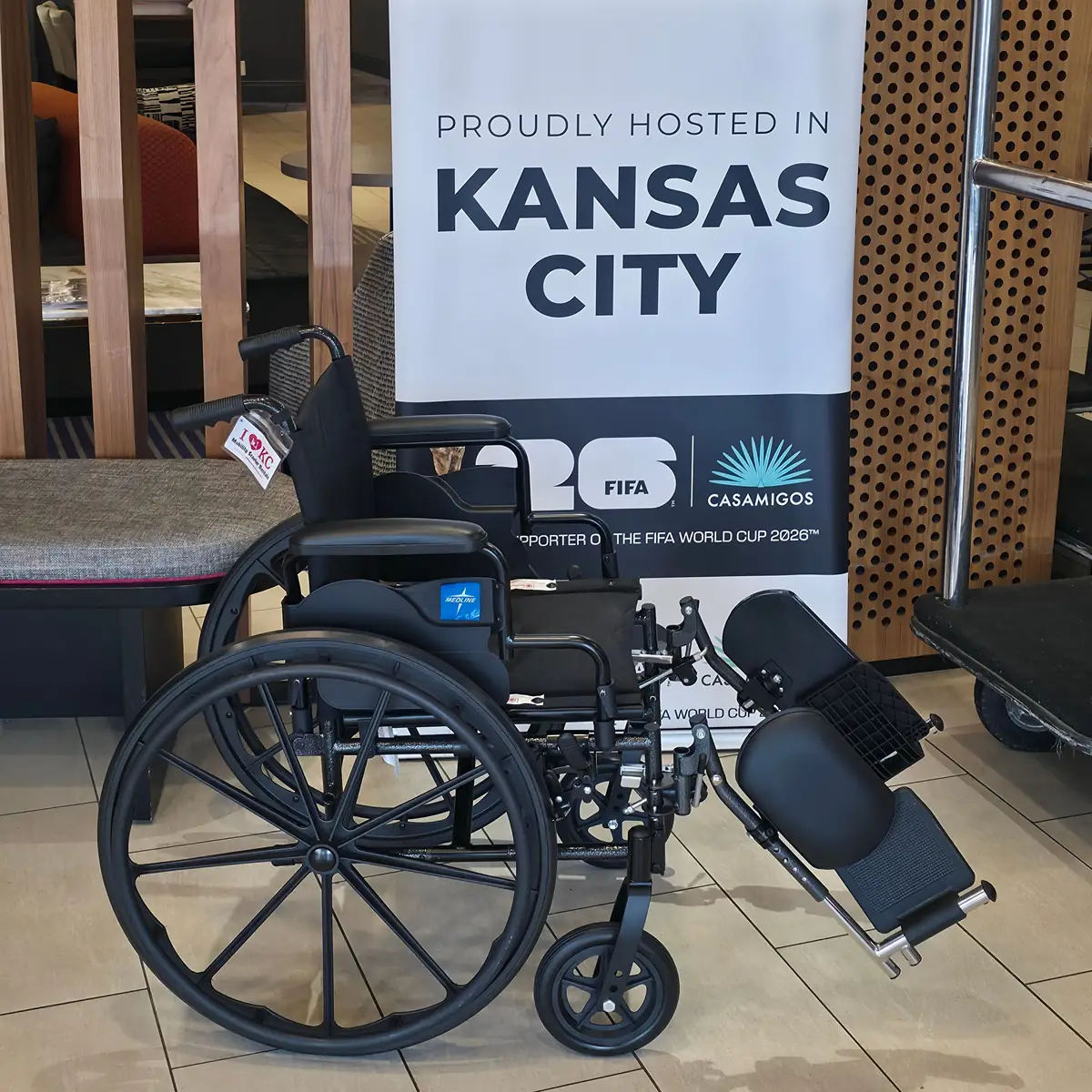 18-inch-seat manual wheelchair with elevating leg rests from KC Mobility Scooter Rentals in a Kansas City hotel lobby