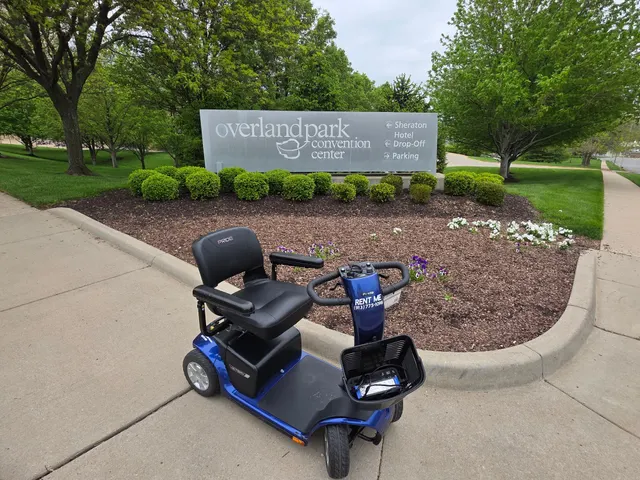 Mobility scooter at the Overland Park Convention Center sign, Overland Park