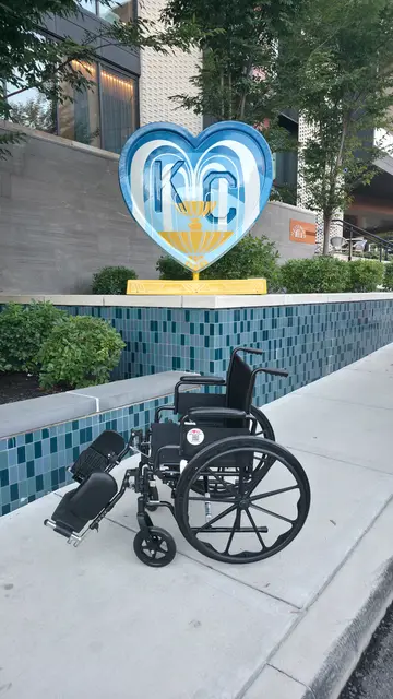 Wheelchair at a tiled water feature, Kansas City